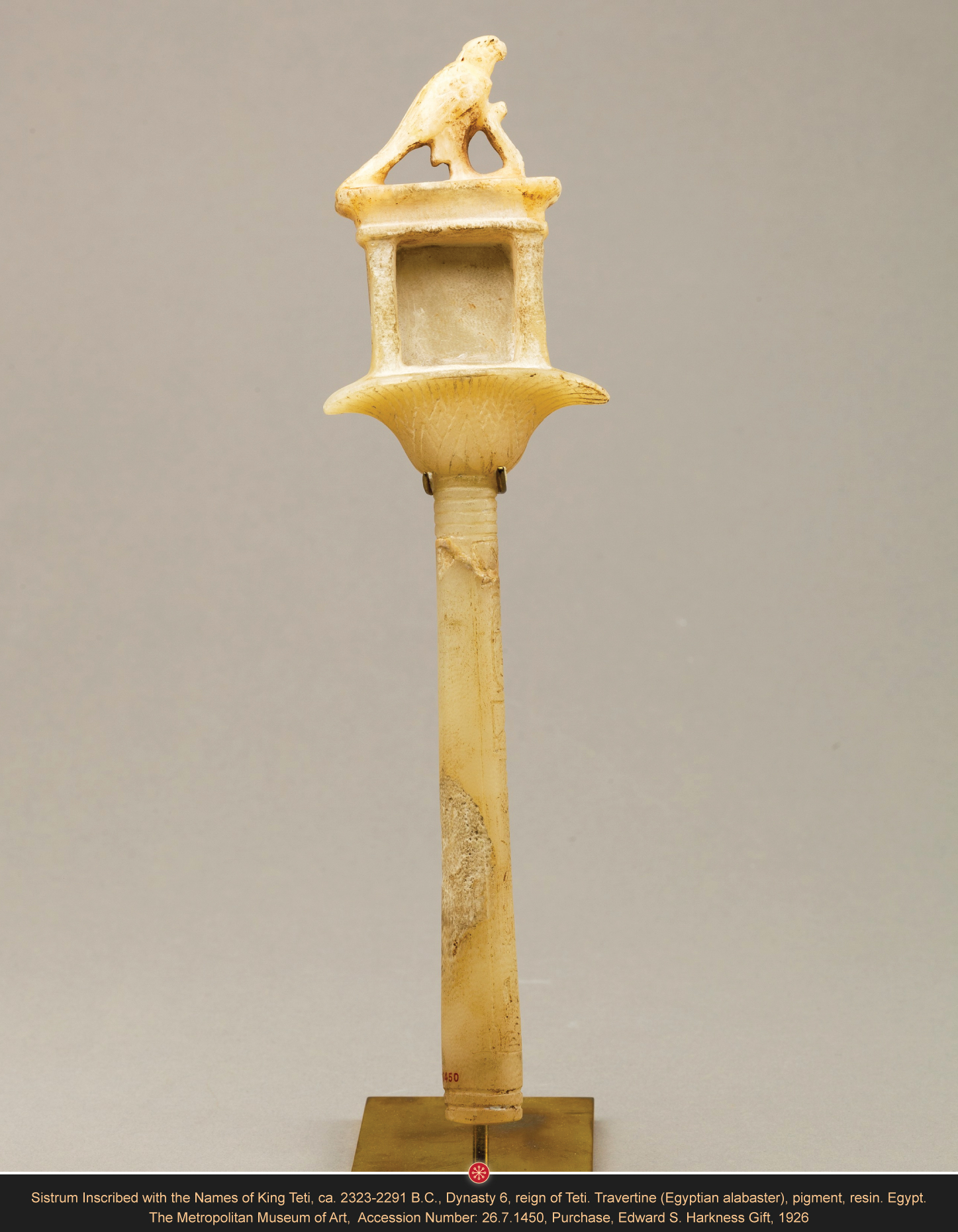 Alabaster Sistrum Inscribed with the Names of King Teti Ca. 2323-2291 B.C., Dynasty 6, reign of Teti. Travertine (Egyptian alabaster), pigment, resin. Egypt. H. 26.5 cm, W: 7 cm, D: 1,7 cm. The Metropolitan Museum of Art, Accession Number: 26.7.1450